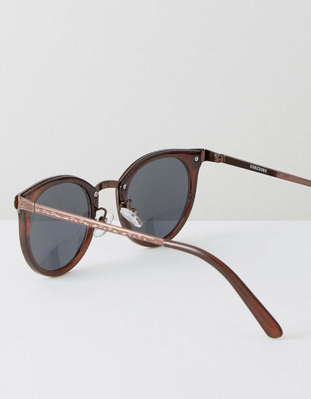 In Brown With Gold Patterned Arms